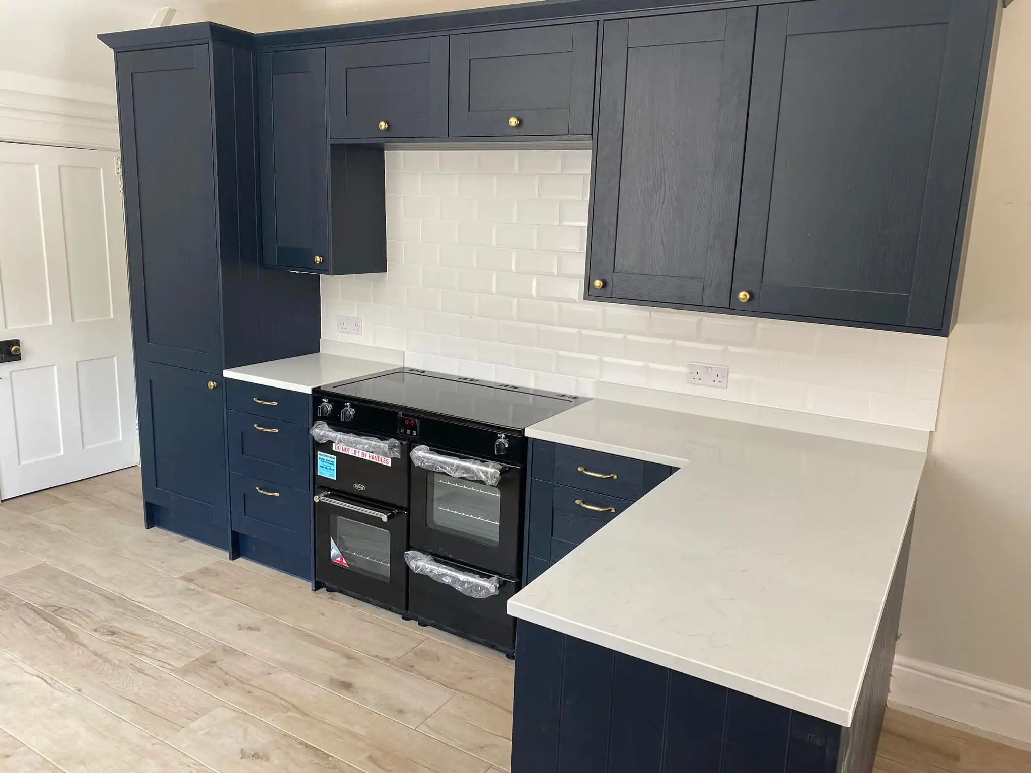 Completed kitchen installation showing modern design and professional craftsmanship