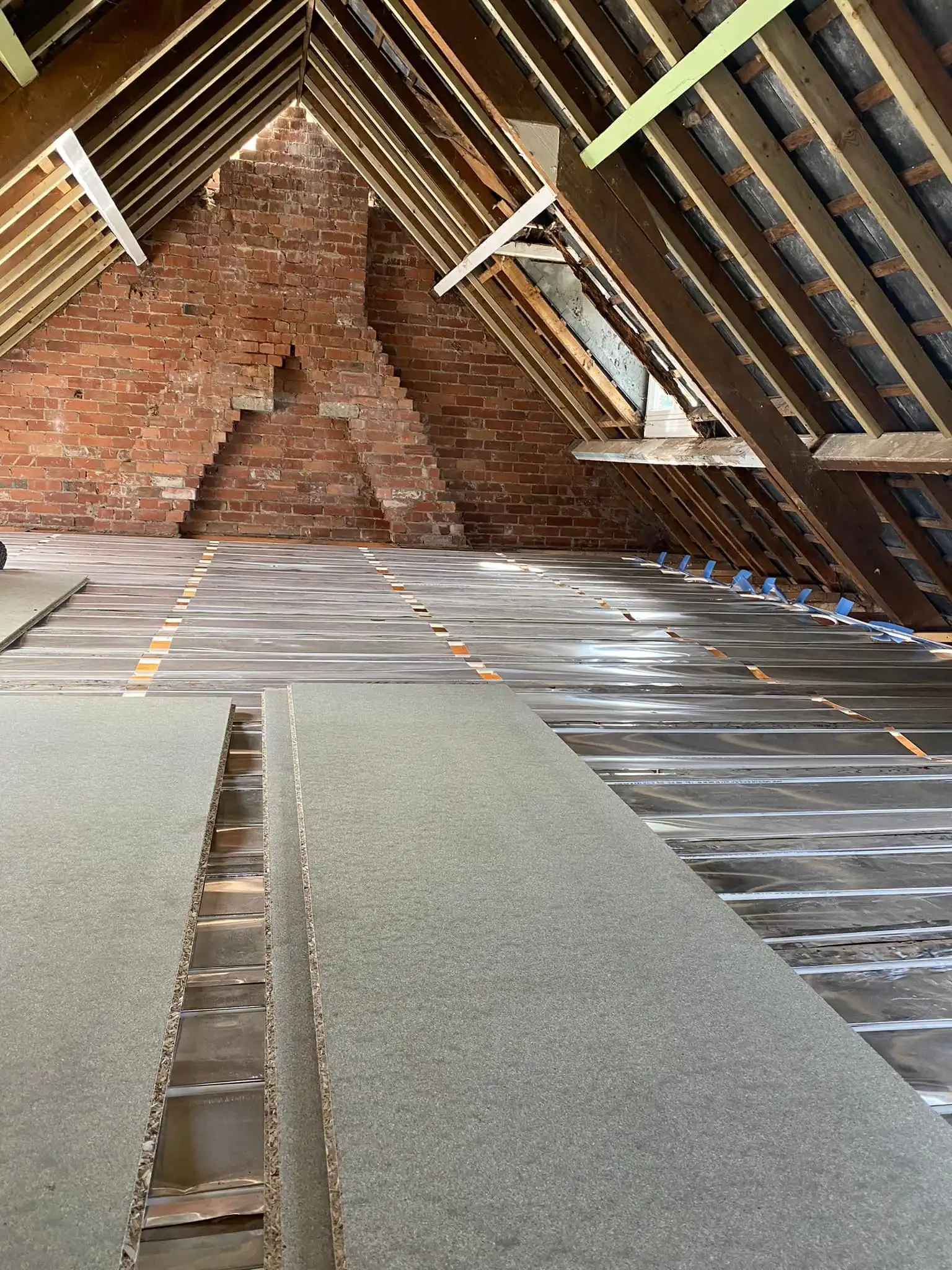 Loft bedroom conversion showing transformed space into peaceful retreat