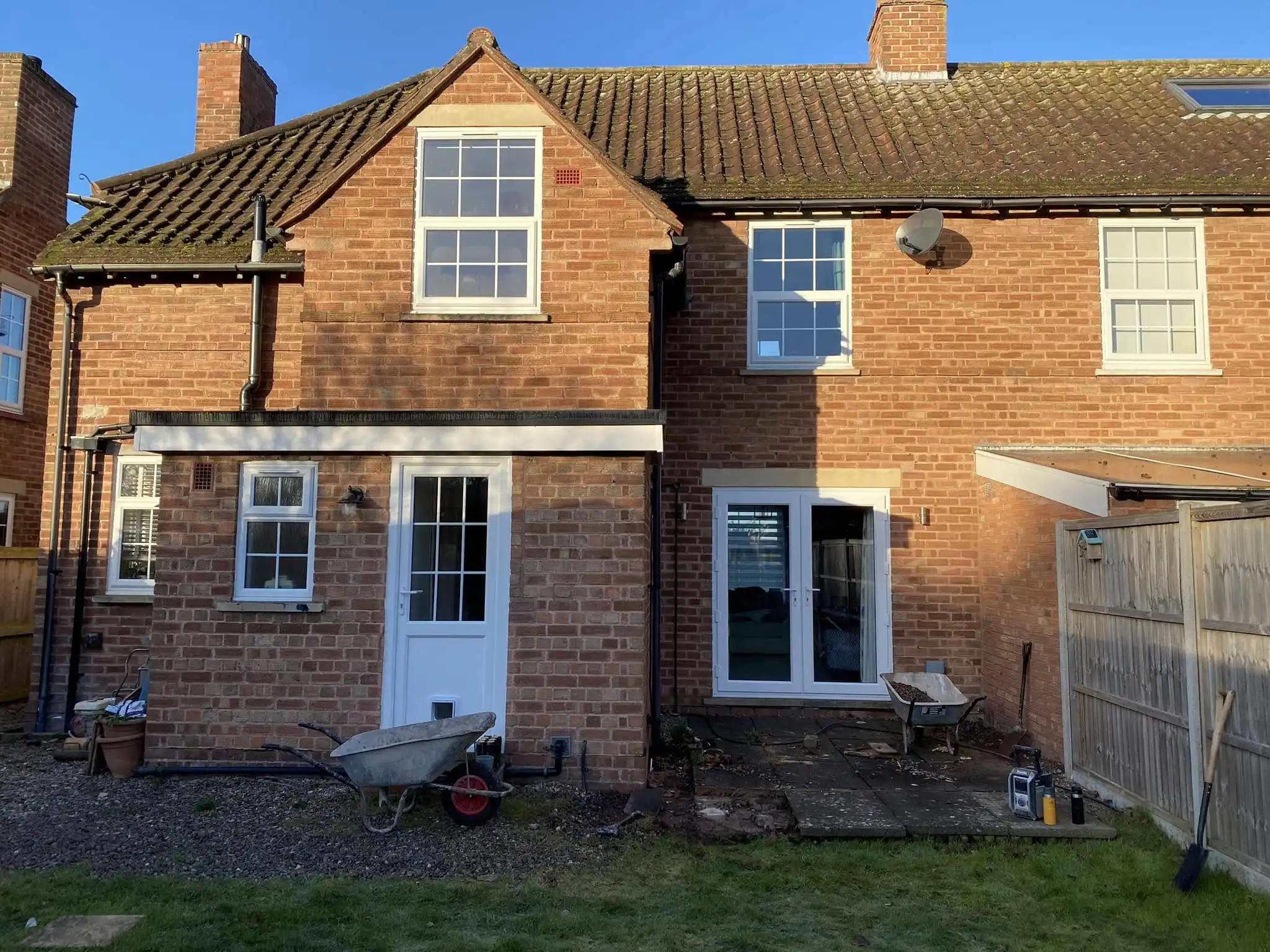 Drainage and guttering installation showing professional exterior work